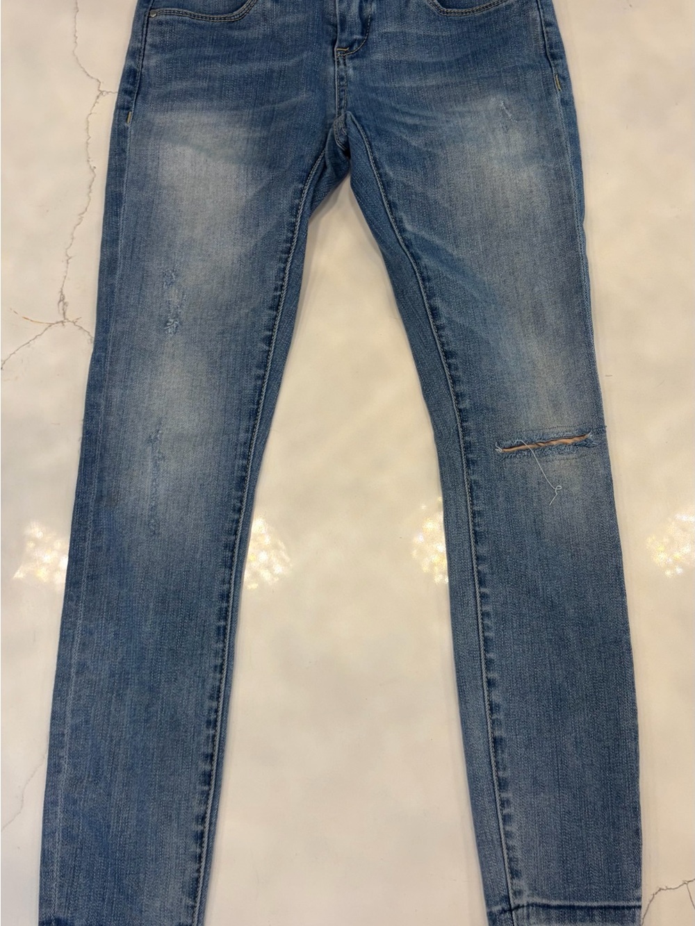 Blank NYC Light Blue Skinny Jeans with Knee Rip